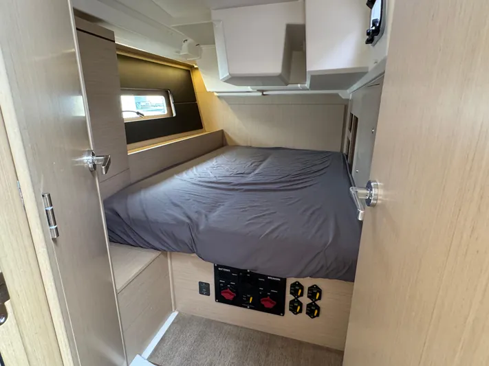 Sensei Yacht Photos Pics Interior cabin of 2021 Beneteau Oceanis 46.1 yacht with cozy bed and modern design.