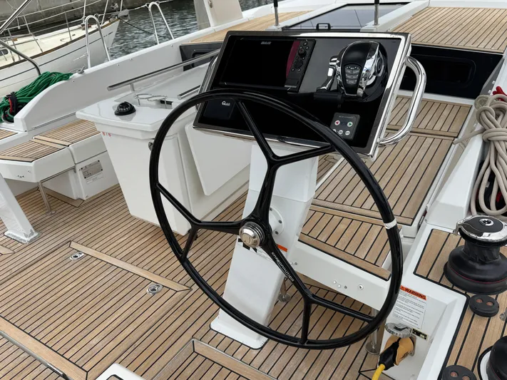 Sensei Yacht Photos Pics Steering wheel and controls of a 2021 Beneteau Oceanis 46.1 yacht.