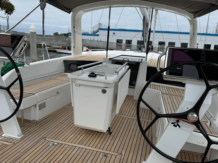 Sensei Yacht Photos Pics Beneteau Oceanis 46.1 yacht cockpit, 2021 model, featuring dual steering wheels and teak decking.