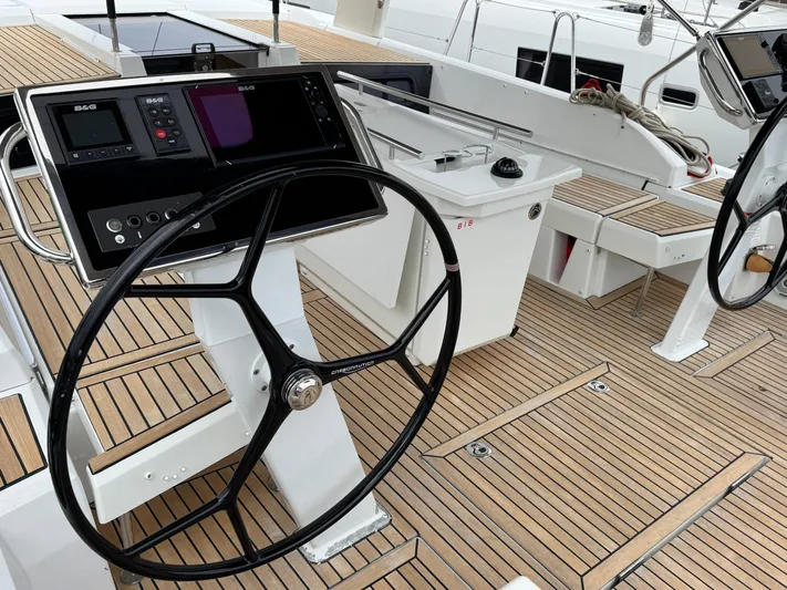 Sensei Yacht Photos Pics Steering wheel and control panel on 2021 Beneteau Oceanis 46.1 yacht deck.