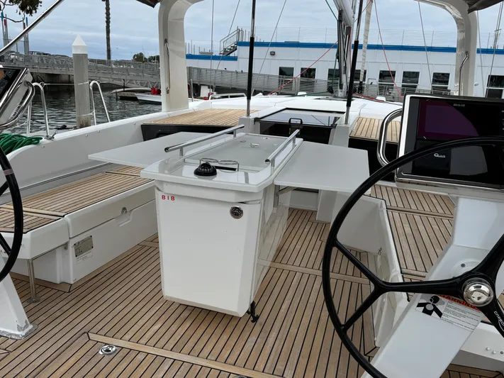 Sensei Yacht Photos Pics Beneteau Oceanis 46.1 yacht cockpit with dual steering wheels and teak decking, 2021 model.