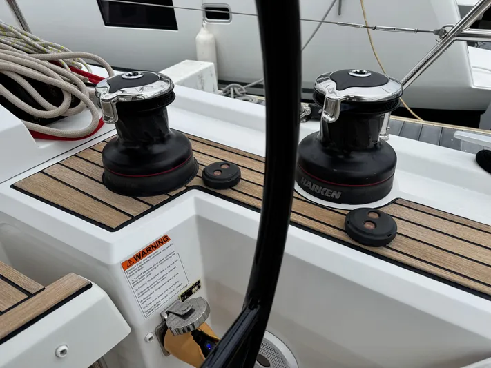 Sensei Yacht Photos Pics Deck of 2021 Beneteau Oceanis 46.1 yacht with winches and ropes.