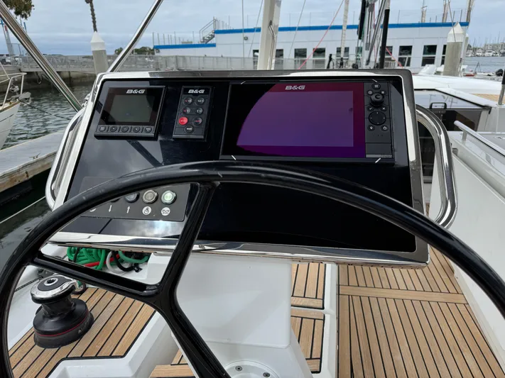 Sensei Yacht Photos Pics Steering wheel and navigation system on 2021 Beneteau Oceanis 46.1 yacht.