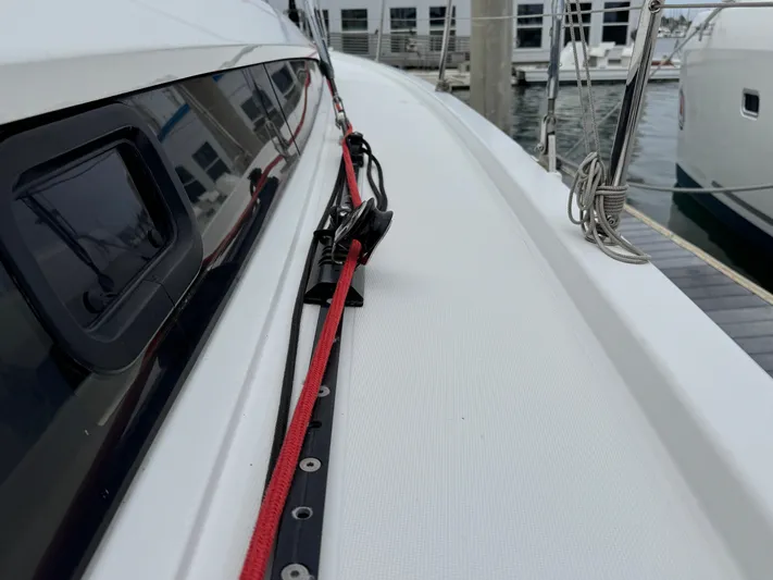 Sensei Yacht Photos Pics Beneteau Oceanis 46.1 sailboat deck with red rope, 2021 model.