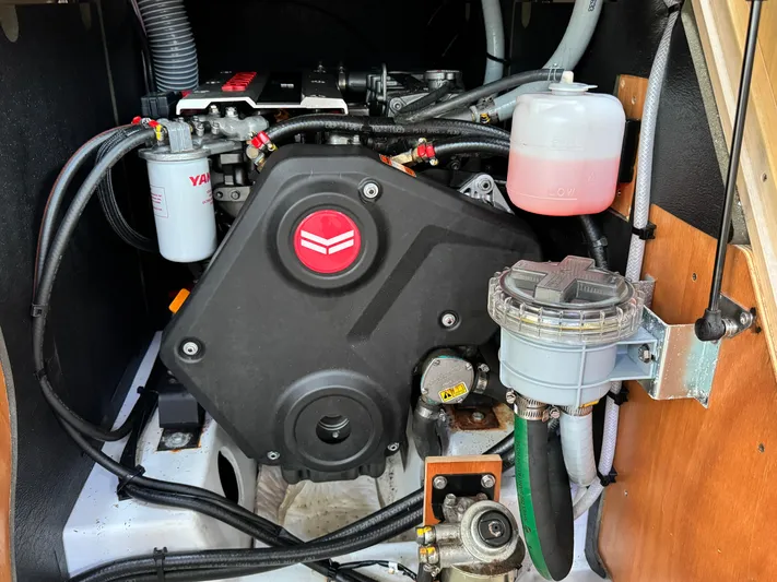Sensei Yacht Photos Pics Engine compartment of a 2021 Beneteau Oceanis 46.1 sailboat, featuring Yanmar components.