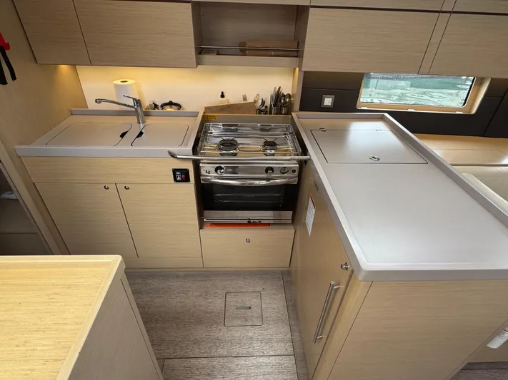 Sensei Yacht Photos Pics Modern kitchen in 2021 Beneteau Oceanis 46.1 yacht with stove and sink.