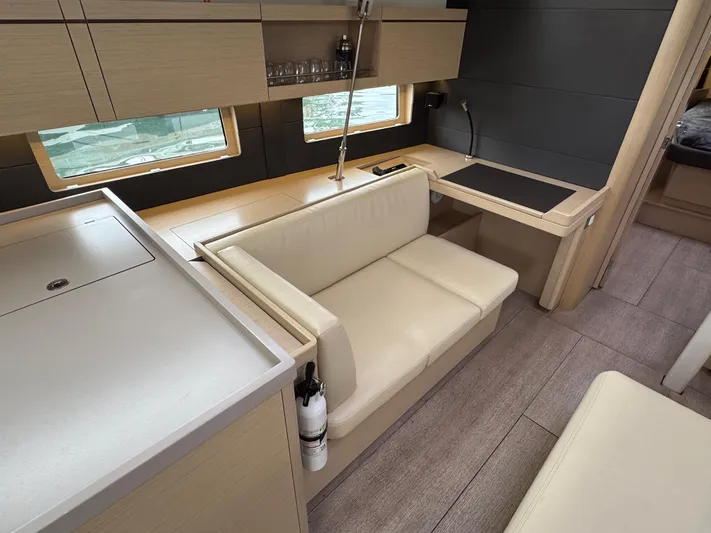 Sensei Yacht Photos Pics Interior of 2021 Beneteau Oceanis 46.1 yacht, featuring modern seating and sleek design.