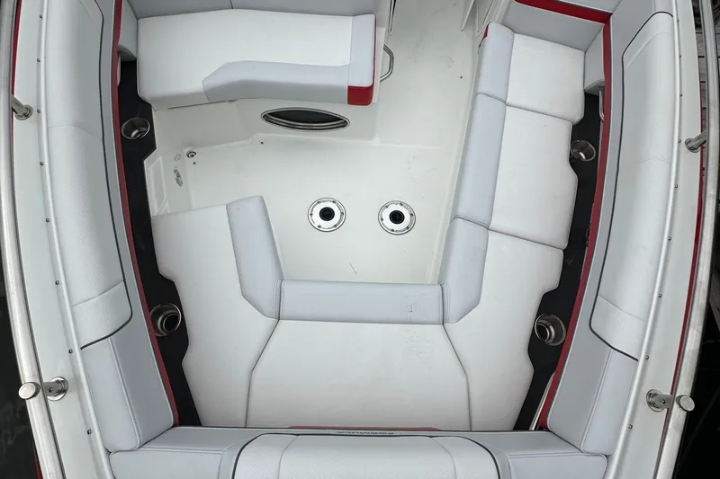  Yacht Photos Pics 2024 Formula 330 CBR boat interior with white seating and red accents.