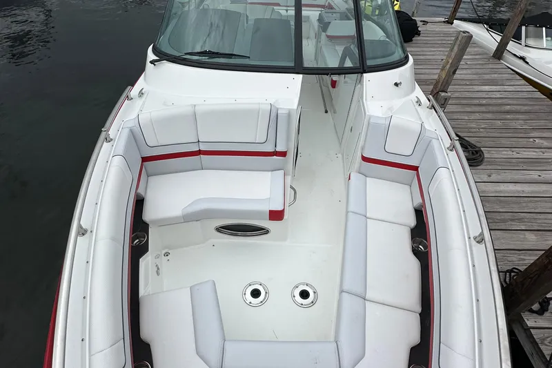  Yacht Photos Pics 2024 Formula 330 CBR boat with spacious seating and sleek design at dock.