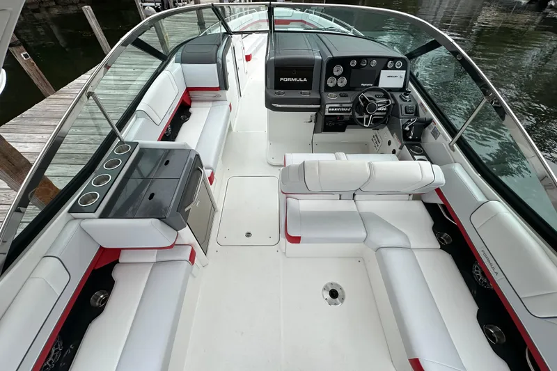  Yacht Photos Pics 2024 Formula 330 CBR boat interior with sleek seating and modern dashboard design.