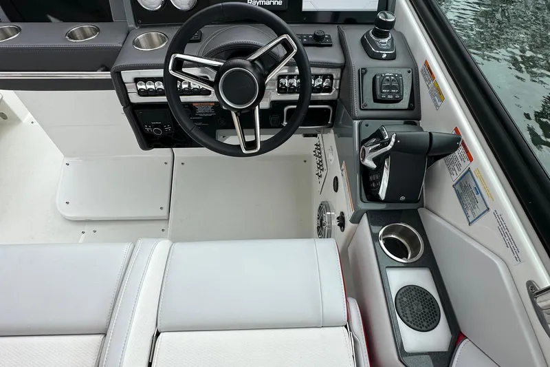  Yacht Photos Pics 2024 Formula 330 CBR boat cockpit with modern steering and controls.