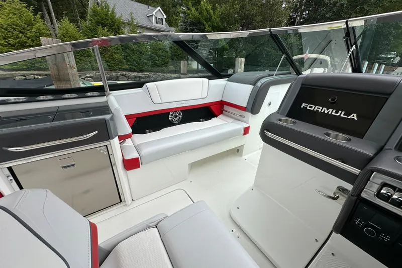  Yacht Photos Pics 2024 Formula 330 CBR boat interior with sleek seating and modern dashboard design.