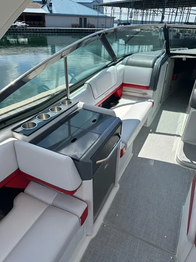  Yacht Photos Pics 2024 Formula 330 Crossover Bowrider I/O interior with seating and cup holders.