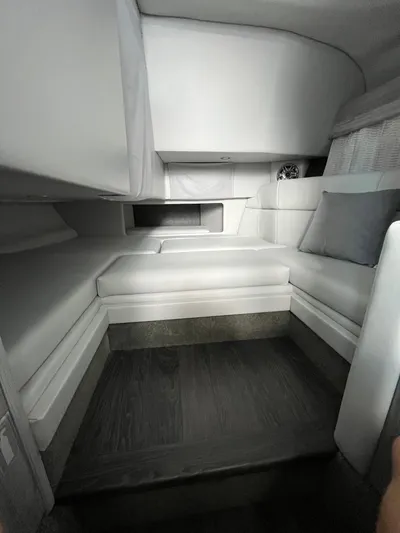  Yacht Photos Pics 2024 Formula 330 Crossover Bowrider I/O cabin interior with sleek white seating.