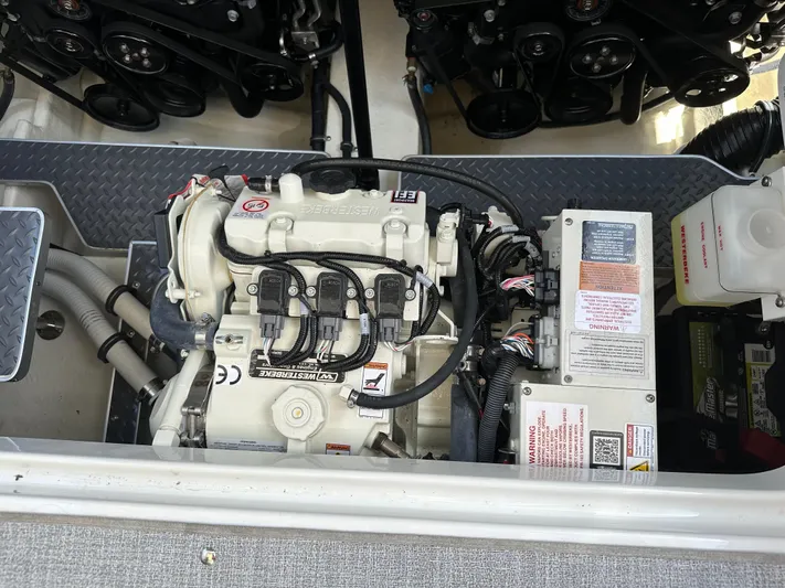  Yacht Photos Pics Engine compartment of 2024 Formula 330 Crossover Bowrider I/O with visible components and wiring.