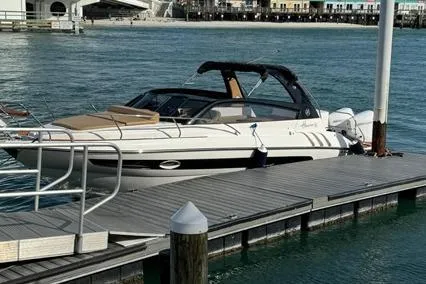  Yacht Photos Pics 2024 Hanover 305 White & Black Edition boat docked at a marina.
