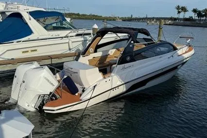  Yacht Photos Pics 2024 Hanover 305 White & Black Edition boat docked in a marina.