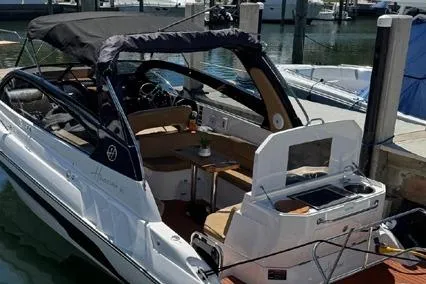  Yacht Photos Pics 2024 Hanover 305 White & Black Edition boat docked at marina, featuring sleek design and modern amenities.