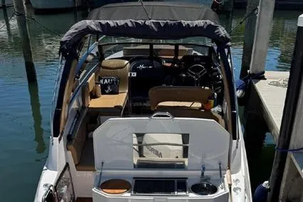  Yacht Photos Pics 2024 Hanover 305 White & Black Edition boat docked at marina, rear view.