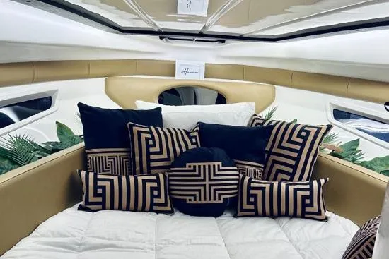  Yacht Photos Pics Luxurious interior of 2024 Hanover 305 White & Black Edition with geometric pillows.