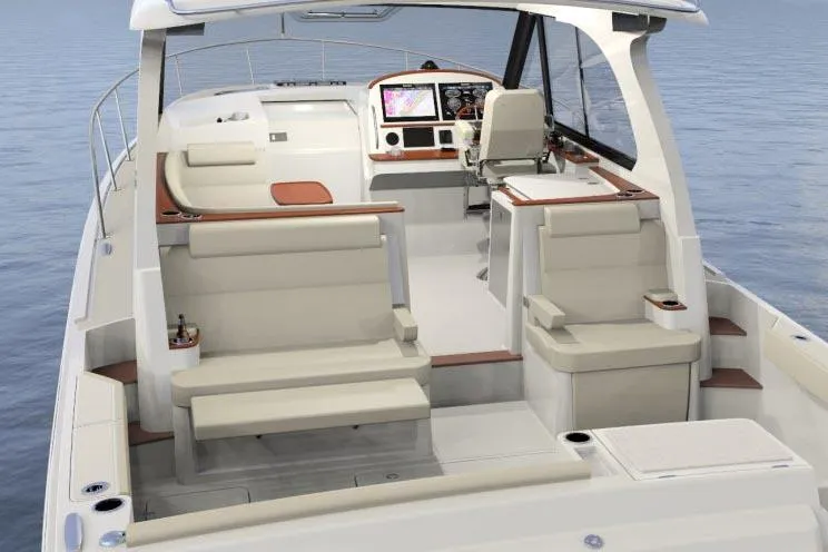  Yacht Photos Pics Manufacturer Provided Image: 2023 Hinckley Sport Boats 40x interior with modern seating and navigation system.