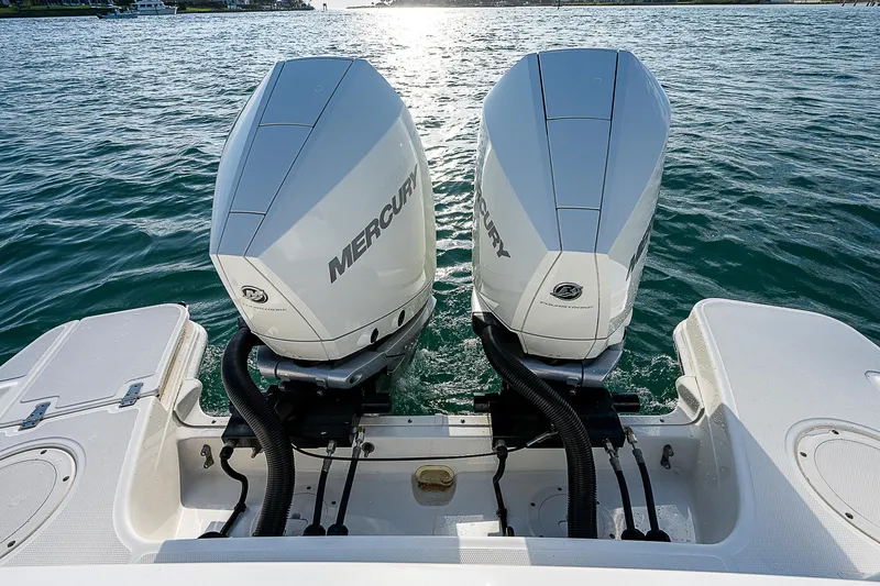  Yacht Photos Pics 2021 Boston Whaler 280 Vantage with dual Mercury outboard engines on water.