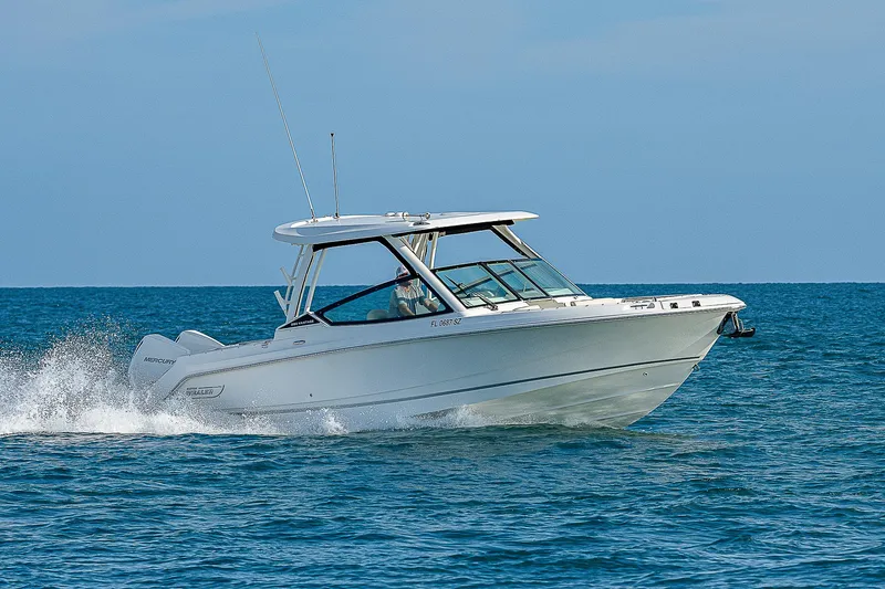  Yacht Photos Pics 2021 Boston Whaler 280 Vantage cruising on open water.