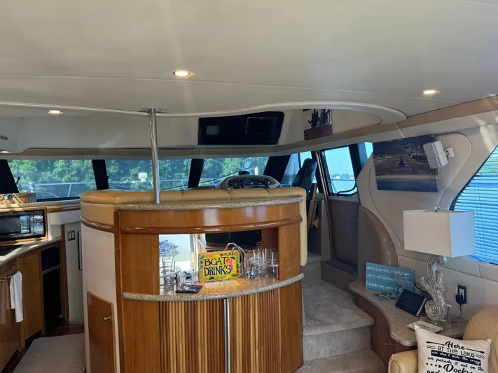  Yacht Photos Pics Luxurious interior of a 2001 Carver 450 Voyager Pilothouse yacht with modern amenities.