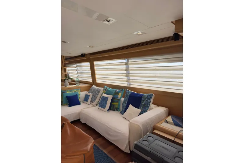  Yacht Photos Pics Luxurious interior of 2010 Ferretti Yachts 800 with elegant seating and decorative cushions.