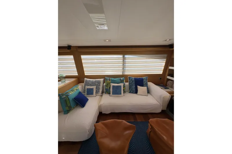  Yacht Photos Pics Luxurious interior of 2010 Ferretti Yachts 800 with elegant seating and decorative cushions.