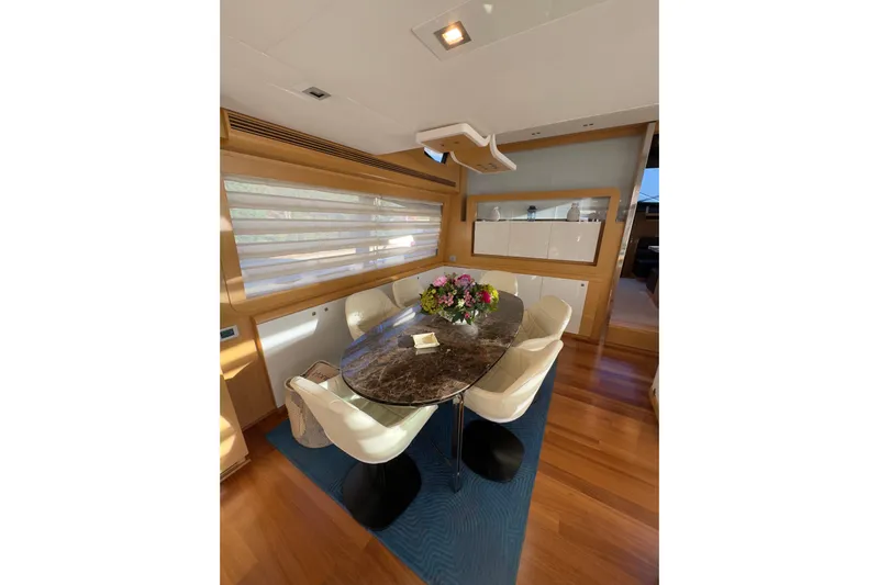  Yacht Photos Pics Luxurious dining area in 2010 Ferretti Yachts 800 with elegant decor and modern furnishings.