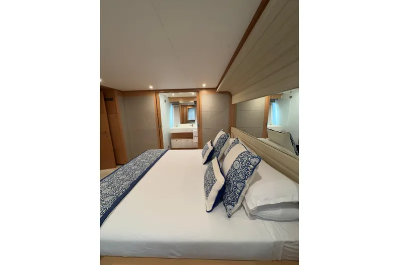  Yacht Photos Pics Luxurious bedroom interior of 2010 Ferretti Yachts 800 with elegant bedding and modern design.