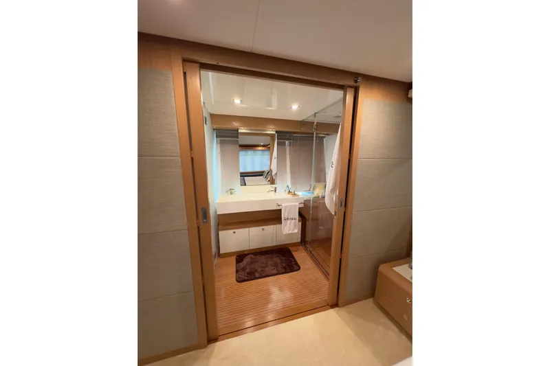  Yacht Photos Pics Luxurious bathroom interior of 2010 Ferretti Yachts 800 with modern fixtures and wooden accents.
