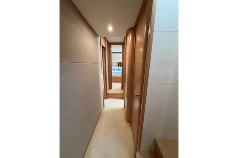  Yacht Photos Pics Hallway inside 2010 Ferretti Yachts 800, featuring modern wood paneling and soft lighting.