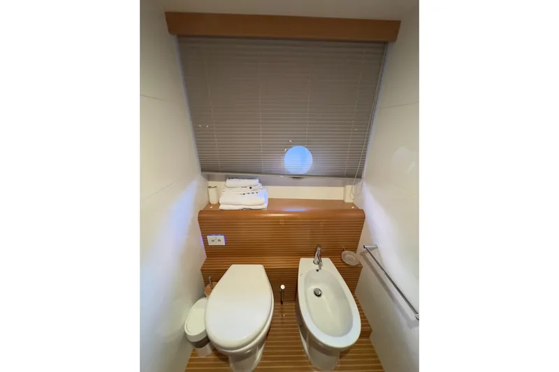  Yacht Photos Pics Luxurious bathroom in 2010 Ferretti Yachts 800, featuring modern fixtures and elegant design.