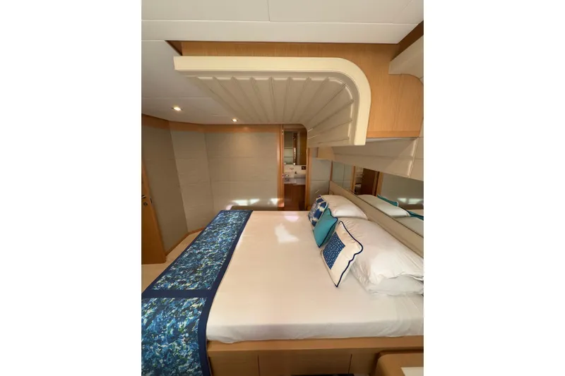 Yacht Photos Pics Luxurious bedroom interior of 2010 Ferretti Yachts 800 with elegant bedding and modern design.