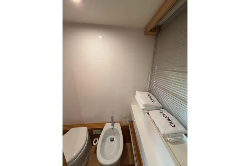  Yacht Photos Pics Luxurious bathroom in 2010 Ferretti Yachts 800, featuring modern fixtures and elegant design.