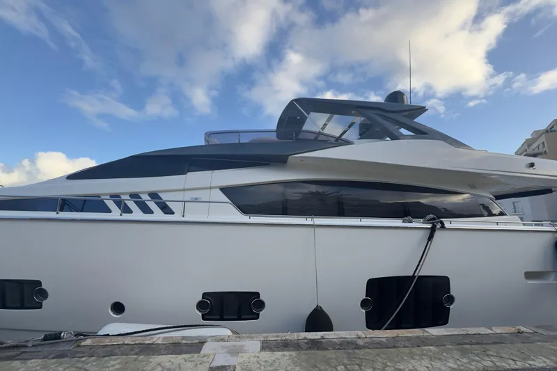  Yacht Photos Pics Luxury 2010 Ferretti Yachts 800 docked under a blue sky.