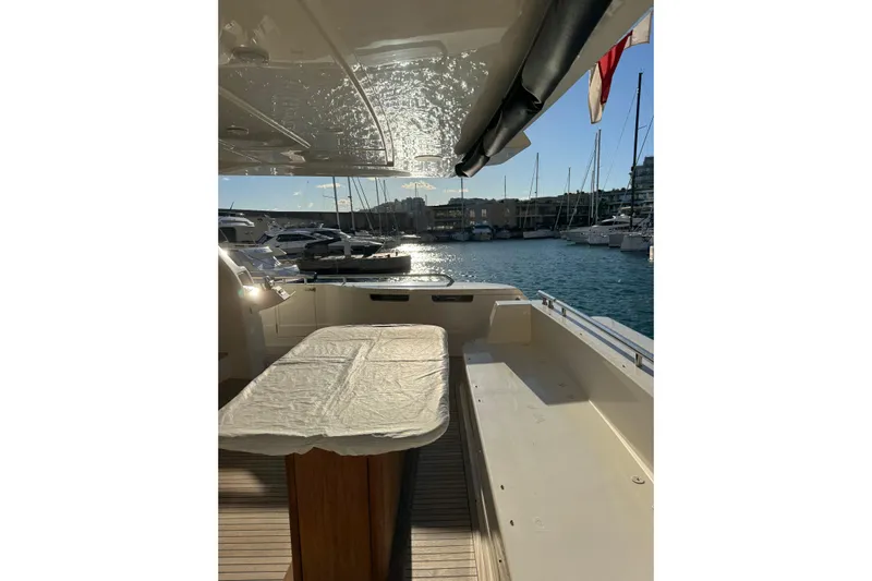  Yacht Photos Pics Luxurious 2010 Ferretti Yachts 800, docked with sunlit deck and marina view.