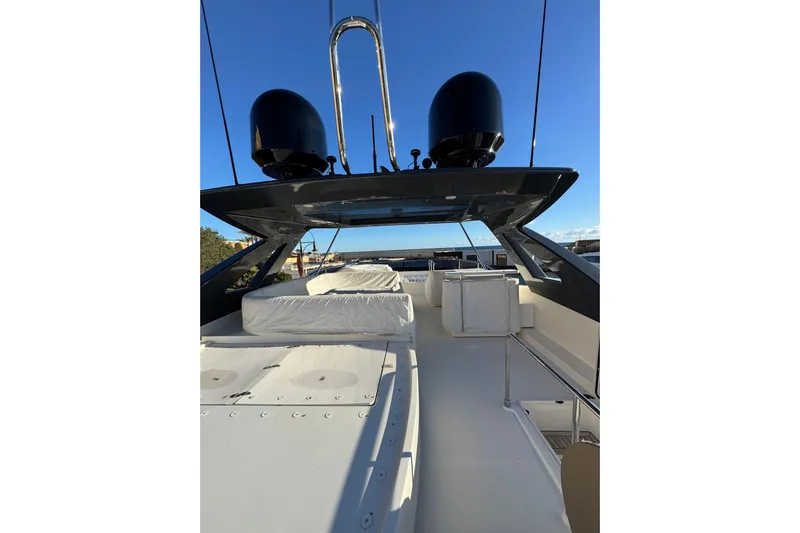  Yacht Photos Pics 2010 Ferretti Yachts 800 flybridge with seating, under clear blue sky.