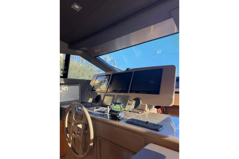  Yacht Photos Pics Helm of 2010 Ferretti Yachts 800 with modern navigation displays and steering wheel.