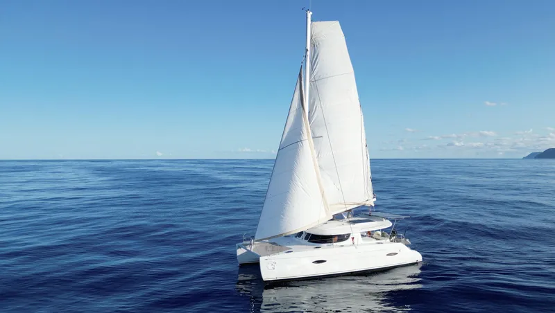 Knotty Nature Yacht Photos Pics Sailing catamaran Fountaine Pajot Lipari 41, 2011 model, on open sea.