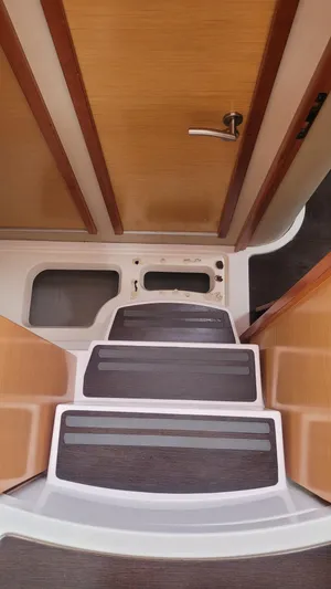 Knotty Nature Yacht Photos Pics Interior stairs of 2011 Fountaine Pajot Lipari 41 catamaran.