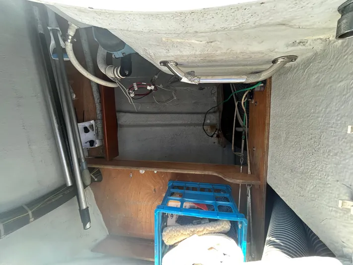 Veronese Yacht Photos Pics Interior view of a 2003 Beneteau First 47.7 sailboat showing storage and equipment.