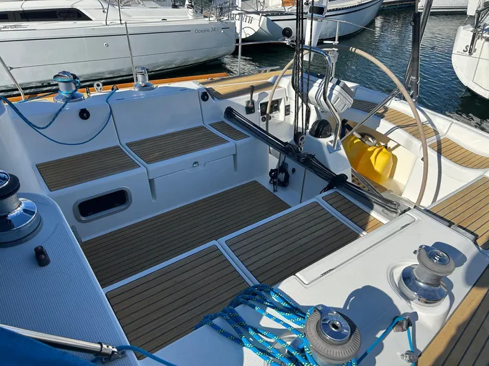 Veronese Yacht Photos Pics Cockpit of 2003 Beneteau First 47.7 sailboat with teak decking and winches.