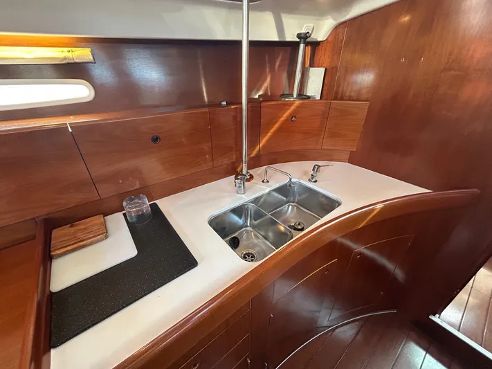 Veronese Yacht Photos Pics Luxurious wooden galley in 2003 Beneteau First 47.7 yacht with double sink.