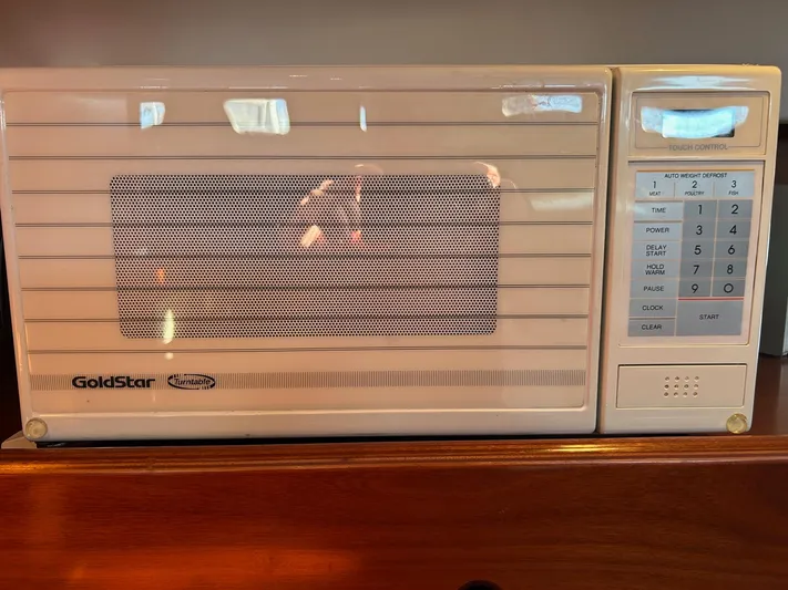 Veronese Yacht Photos Pics Old GoldStar microwave on Beneteau First 47.7 yacht, 2003 model.