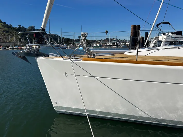 Veronese Yacht Photos Pics Beneteau First 47.7 sailboat, 2003 model, docked in a marina under clear blue skies.