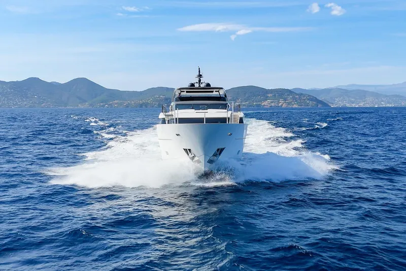 Le Gypsy Yacht Photos Pics Sanlorenzo 102A 2018 yacht cruising on open sea with scenic mountain backdrop.