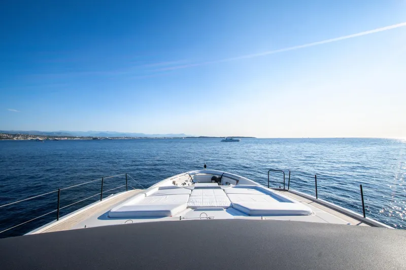 Le Gypsy Yacht Photos Pics Luxurious 2018 Sanlorenzo 102A yacht cruising on a serene ocean under a clear blue sky.